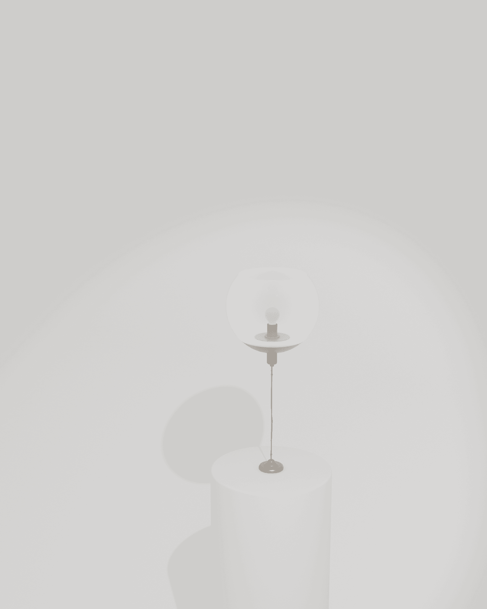 A frosted glass globe fixture, turned so its ceiling plate rests as a base on a museum plinth, glowing softly from within, inside a built white gallery cove lit by a single precise spot, casting one long soft shadow across the floor